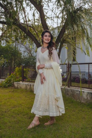 Beautiful full sleeve embroidery sequence faux georgette cream gown