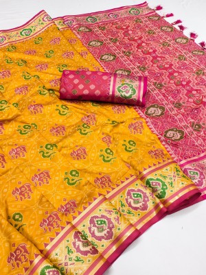 Beautiful traditional rich pallu minaxi patola soft silk yellow saree