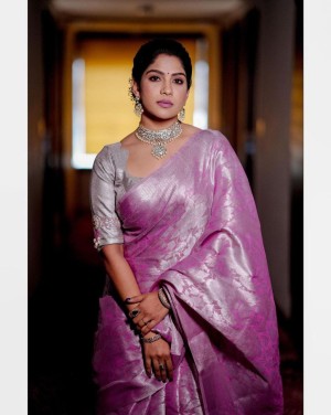Exclusive sequence border banarasi silk peach saree