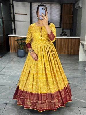 Kalamkari printed unbeatable soft tissue silk yellow gown