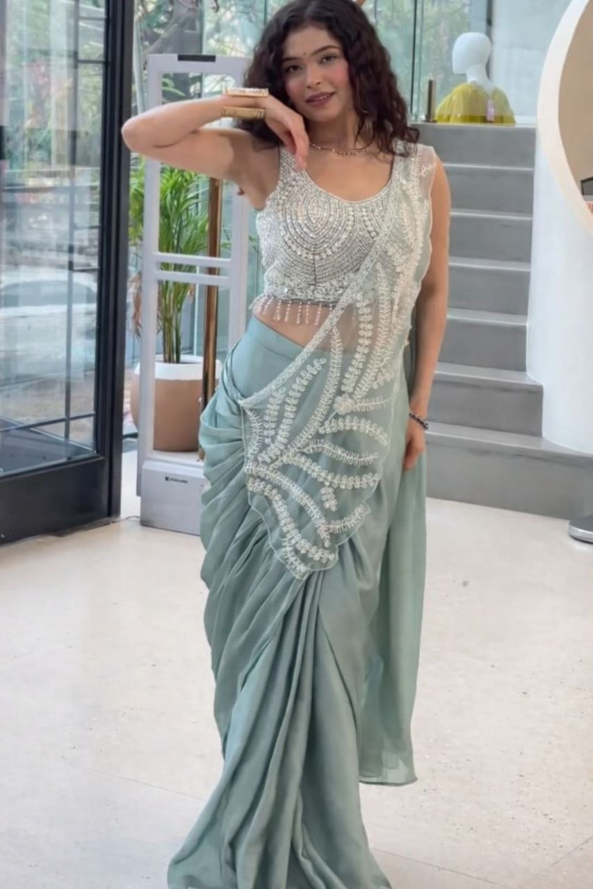 Astonishing embroidery sequence georgette pista saree