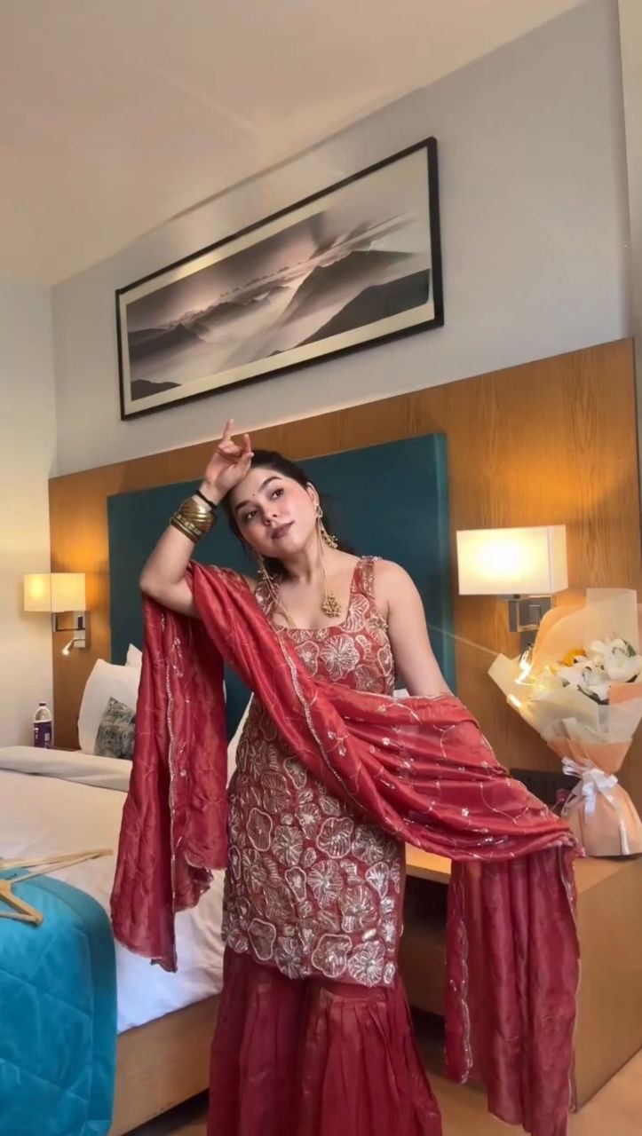 Presenting sequence thread stitched silk red sharara suit