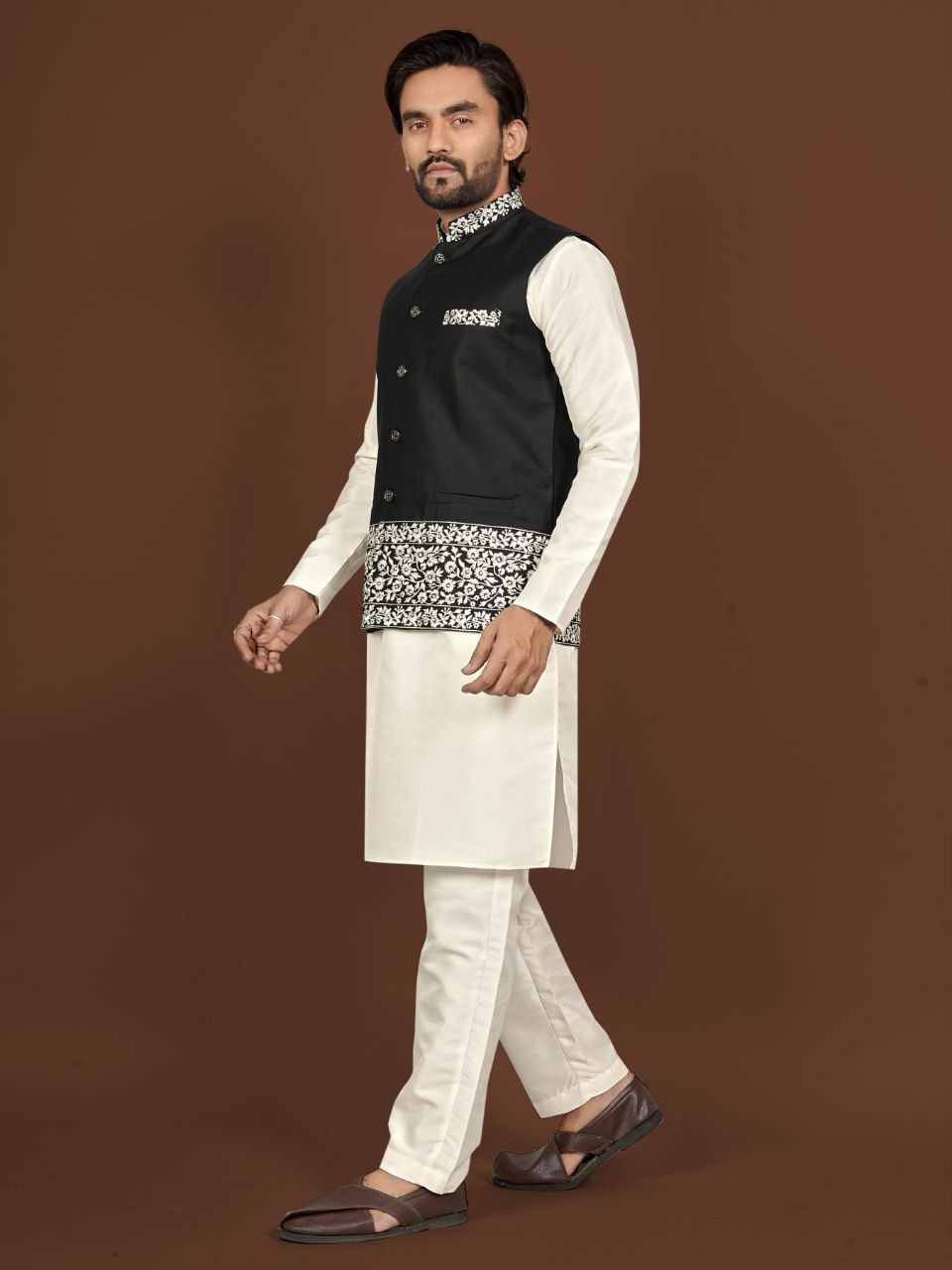 Presenting embroidery silk black kurta pajama