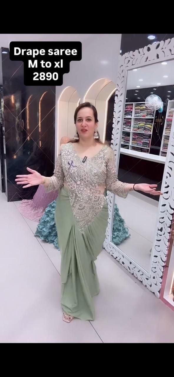 Presenting embroidery sequence heavy crepe pista saree