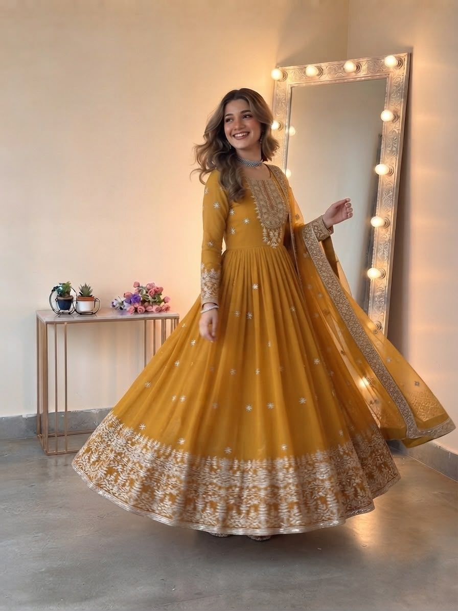 Attracting embroidery georgette yellow gown