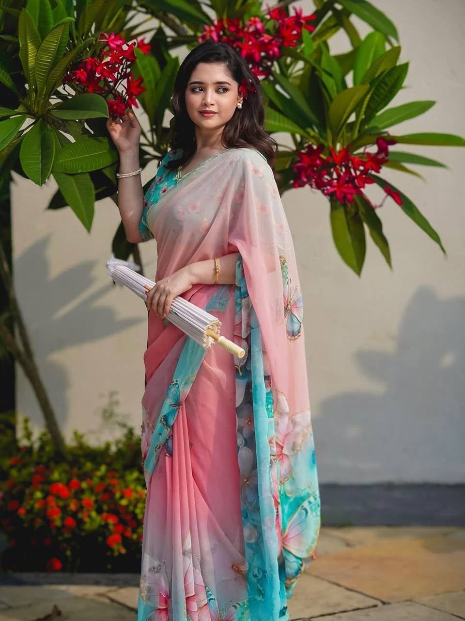 Trending digit print pure georgette blue saree